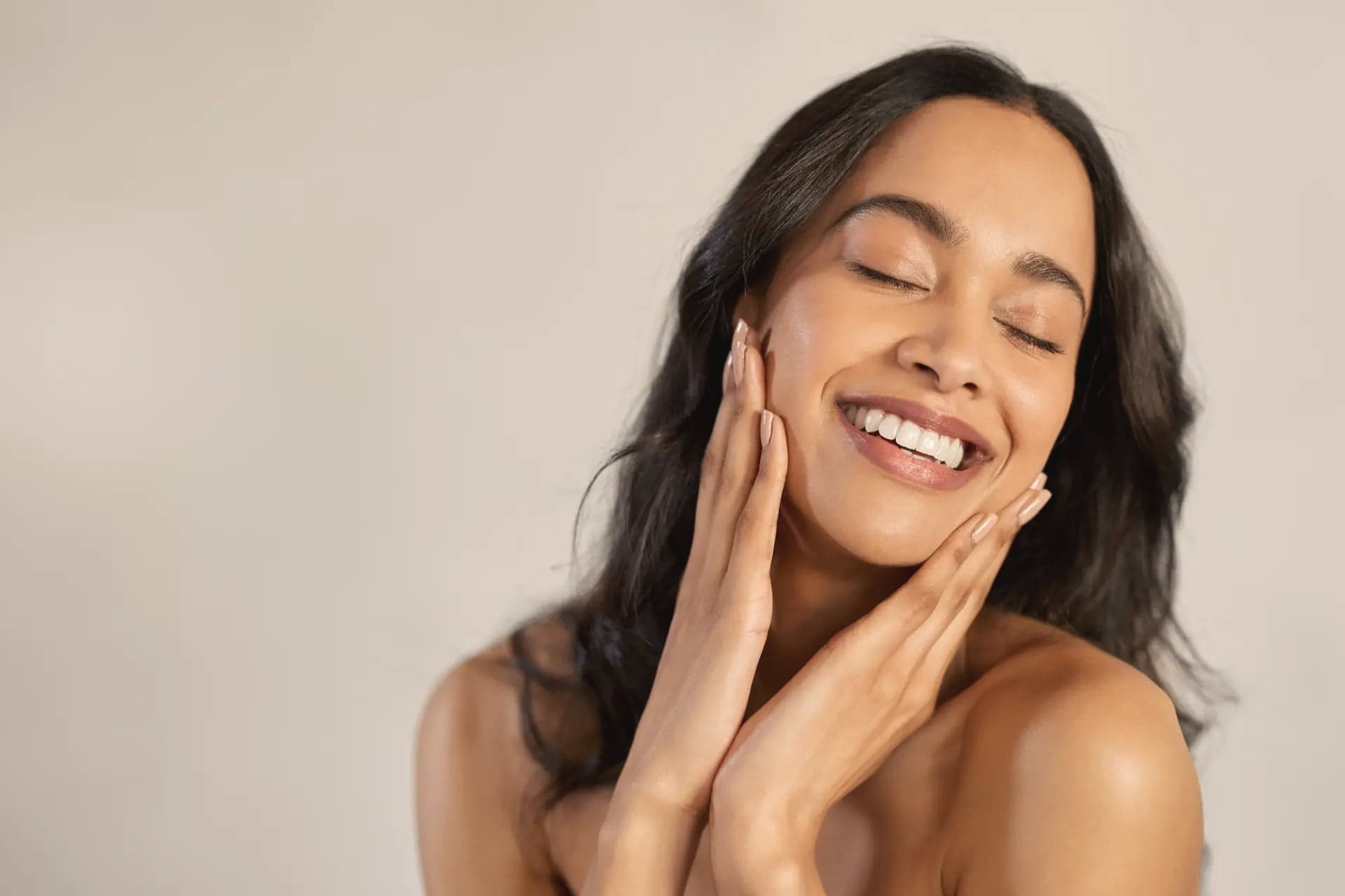 Close-up beauty portrait of a woman touching her chin